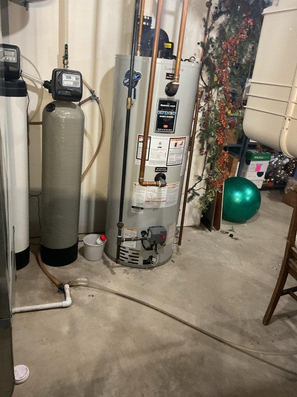 Completed comprehensive AC tune-up on residential system. Found outdoor condenser coil completely plugged with debris, performed thorough coil cleaning to restore proper airflow and heat transfer. Verified system operation with 14° temperature split at 800 CFM airflow, which is within acceptable parameters. Noted Y2 terminal not jumpered at unit with only two-wire thermostat connection present—system has operated satisfactorily for four years in current configuration, so no modifications were made to avoid potential issues during peak cooling season. Completed all standard maintenance procedures and confirmed proper system operation.