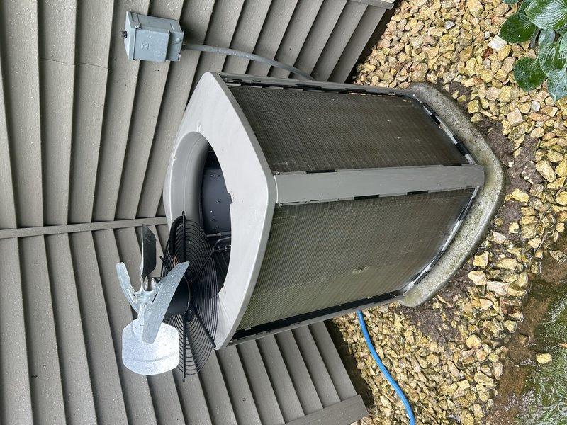 Completed comprehensive air conditioning tune-up and maintenance service. Tested system operation and confirmed proper cooling performance with good temperature drop in basement zone. Inspected air filter and verified clean condition. Cleared condensate drain line to ensure proper drainage and prevent water backup. Proceeded to outdoor unit where condenser coil was thoroughly washed to remove accumulated dust and debris from heat exchanger fins. Inspected all exterior components including fan assembly, refrigerant lines, and electrical connections for proper operation and condition. Unit is operating efficiently with all systems functioning within normal parameters.
