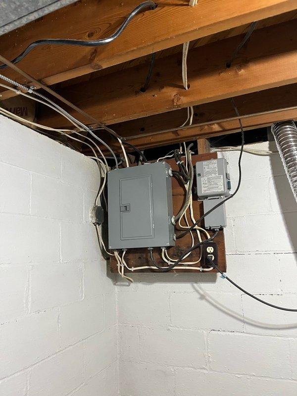 Performed comprehensive AC tune-up on residential split system. Inspected and confirmed air filter, blower assembly, and evaporator coil were clean with proper drainage. Verified all electrical components operating within manufacturer specifications. Cleaned condenser coil, tested system operation for 15 minutes, and confirmed proper cooling with 19-20 degree temperature differential across the coil. Left replacement filter on-site. System operating normally with no issues found.
