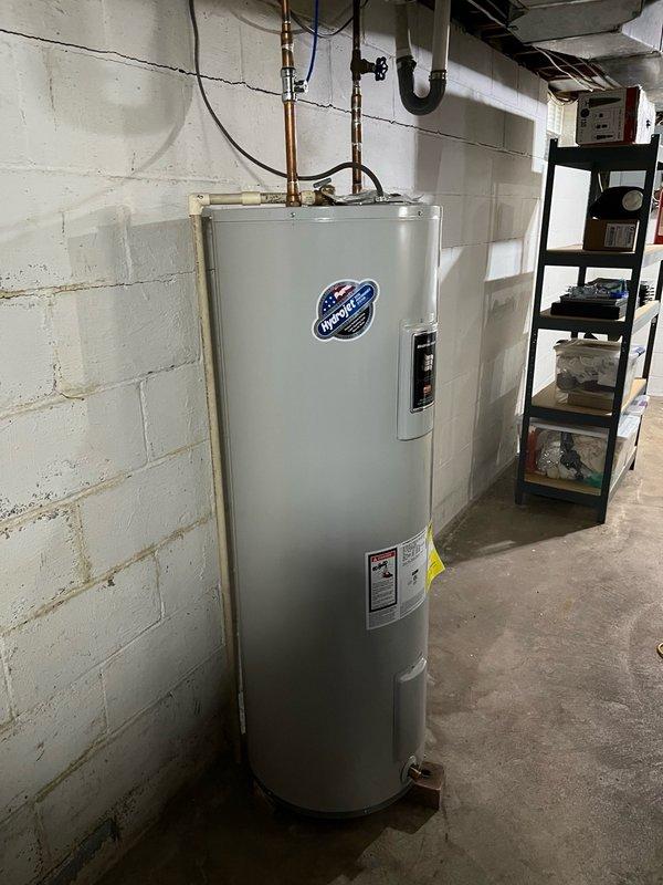 Performed comprehensive AC tune-up on residential split system. Inspected and confirmed air filter, blower assembly, and evaporator coil were clean with proper drainage. Verified all electrical components operating within manufacturer specifications. Cleaned condenser coil, tested system operation for 15 minutes, and confirmed proper cooling with 19-20 degree temperature differential across the coil. Left replacement filter on-site. System operating normally with no issues found.