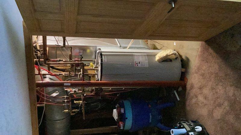 Responded to emergency service call for flooded basement conditions. Upon arrival, inspected sump pump system and identified failure of temperature and pressure relief valve on water heater as source of flooding. Replaced faulty TP relief valve with new code-compliant unit, tested for proper operation and verified no additional leaks in plumbing system.