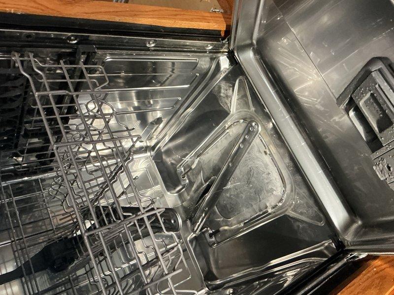 Responded to a recurring dishwasher drainage issue that had been previously addressed. Upon inspection, tested the dishwasher by running it into the sink, which drained properly, indicating the unit itself was functioning correctly. Reassembled the dishwasher drain connection to the standpipe, ensuring proper positioning and depth to prevent blockage. Performed three complete fill and drain cycles to verify proper operation and confirm the issue was resolved.
