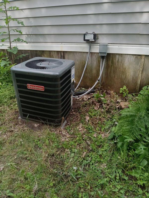 Responded to no cooling complaint on Goodman air conditioning system. Upon arrival, found condenser operating but system not cooling. Connected manifold gauges and measured 18 psi on suction side, indicating severely low refrigerant charge. Inspected evaporator coil for signs of oil indicating leak location but found no visible evidence. Noted service valve caps were missing from outdoor unit upon arrival; however, valve cores tested and were not actively leaking at time of inspection. Provided refrigerant recharge estimate to restore cooling operation, but homeowner declined service.