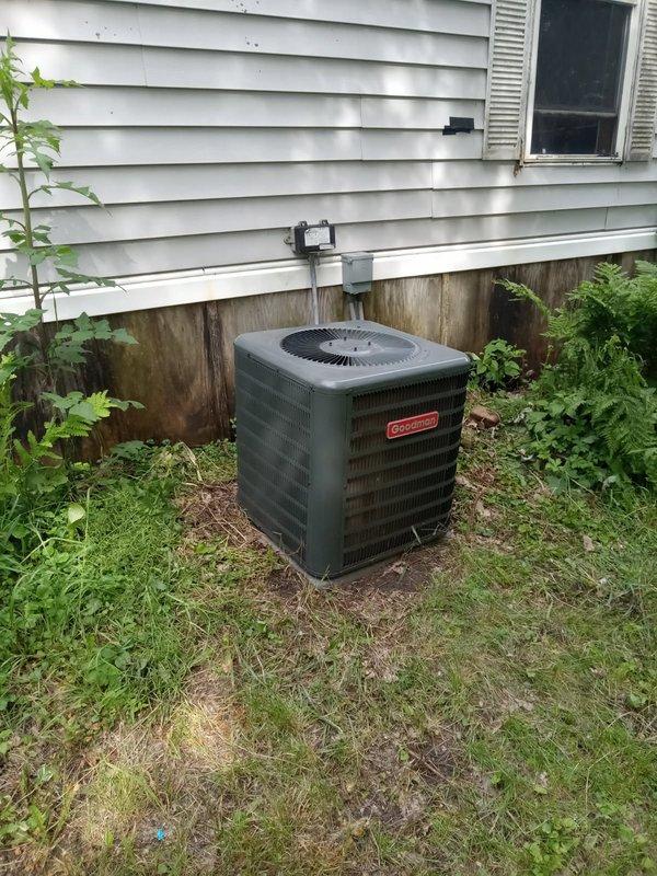 Responded to no cooling complaint on Goodman air conditioning system. Upon arrival, found condenser operating but system not cooling. Connected manifold gauges and measured 18 psi on suction side, indicating severely low refrigerant charge. Inspected evaporator coil for signs of oil indicating leak location but found no visible evidence. Noted service valve caps were missing from outdoor unit upon arrival; however, valve cores tested and were not actively leaking at time of inspection. Provided refrigerant recharge estimate to restore cooling operation, but homeowner declined service.