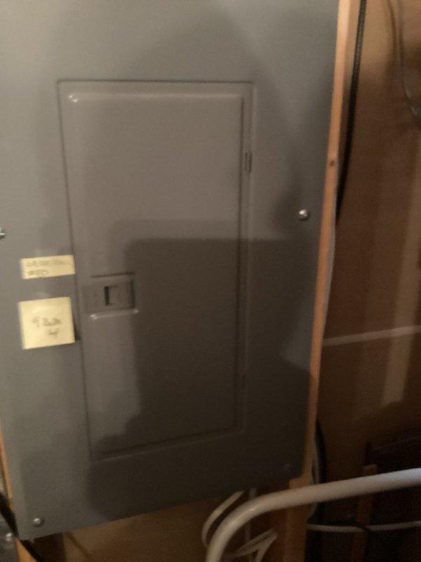 Responded to emergency water leak under kitchen sink. Upon inspection, identified garbage disposal as source of dripping leak. Removed defective disposal unit and installed standard sink strainer in its place, eliminating the leak and restoring proper drainage function.