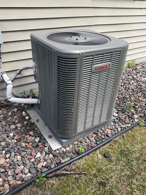 # HVAC Service Report

Responded to no cool complaint on Lennox residential air conditioning system. Unit was found to be low on refrigerant and not cooling adequately. Added UV leak detection dye to system and recharged refrigerant to proper operating levels using manifold gauges. System pressures and temperatures were verified and brought within normal operating parameters. Customer advised that unit is under warranty and to monitor system performance for potential leak issues.