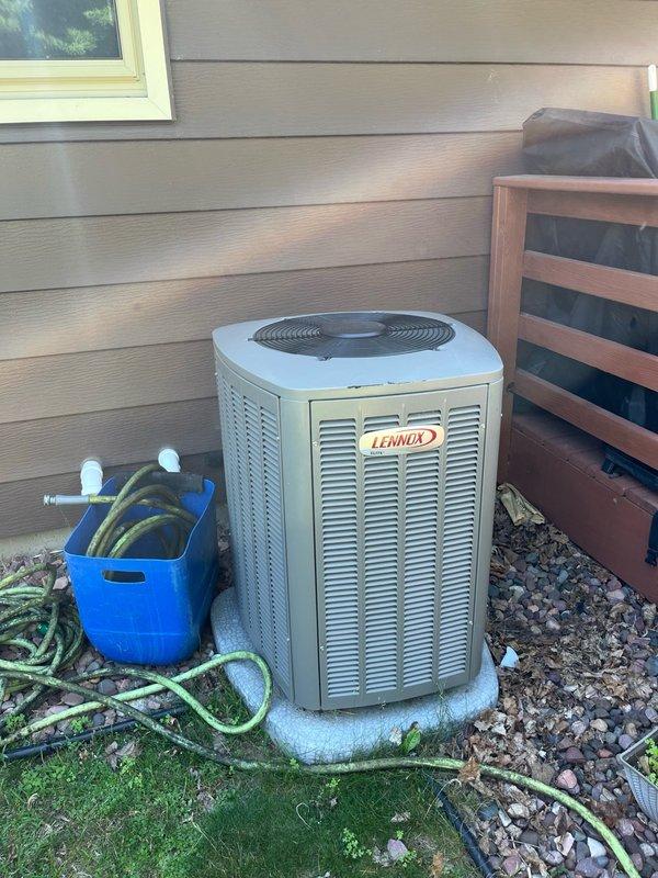 Completed Family Rewards preventive maintenance cooling visit on Lennox air conditioning system. Inspected air filter and found it moderately soiled; replaced with customer-supplied filter. Verified blower assembly was clean and properly balanced. Evaporator coil showed no buildup and confirmed proper condensate drainage. Performed electrical component inspection on outdoor condensing unit, checking all routine connections and controls. Cleaned condenser coil to ensure optimal heat transfer. Conducted operational testing with 15-minute runtime to verify system performance. System achieved temperature differential exceeding 24 degrees, confirming proper refrigerant charge and efficient operation. All components functioning within normal parameters.