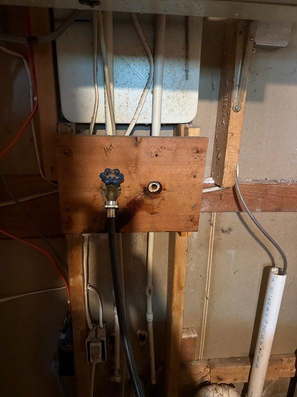 Responded to emergency water leak caused by damaged PVC supply line to washing machine, which occurred during appliance installation by third-party installers. Replaced broken water line and installed new shutoff valves to restore proper water supply and prevent future leaks. All connections tested and verified leak-free upon completion.