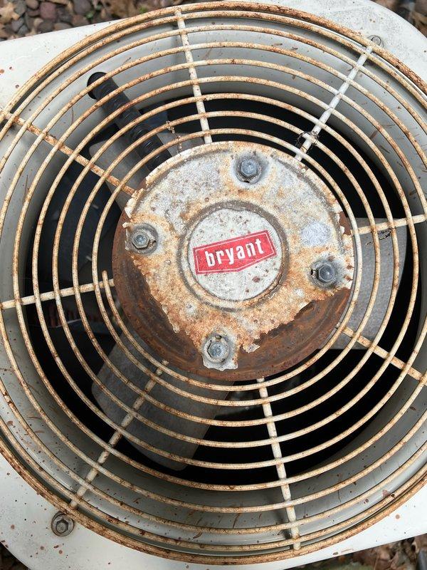 Responded to service call for air conditioning system running continuously and not maintaining temperature. Upon arrival, inspected system and found outdoor condenser unit heavily soiled with debris accumulation on coil surfaces. Performed exterior coil cleaning by rinsing condenser unit to remove dirt and debris buildup. Conducted refrigerant pressure diagnostics and identified significantly low R22 refrigerant charge, indicating system leak. Documented findings including aged equipment condition, corroded fan assembly, and compromised refrigerant levels. Advised property owner that system requires leak detection and repair services, and recommended obtaining repair estimates to evaluate cost-effectiveness given equipment age and R22 refrigerant phase-out considerations. Coordinated follow-up appointment with comfort advisor for comprehensive system evaluation and replacement options discussion.