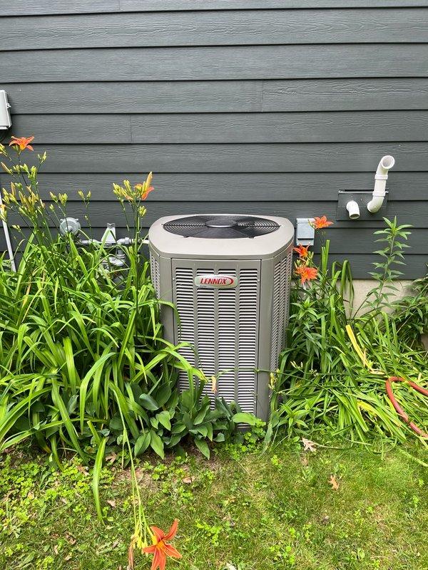 Performed comprehensive AC tune-up on Lennox system. Upon arrival, conducted initial consultation and system assessment. Inspected air filter and found it heavily soiled; replaced with new filter. Examined blower assembly, confirming proper balance and cleanliness. Verified evaporator coil condition and confirmed proper condensate drainage operation. 

Inspected outdoor condenser unit and identified significant debris accumulation restricting airflow through coil fins. Performed electrical testing on all system components, confirming voltage, amperage, and capacitor readings within manufacturer specifications. Conducted operational test with 15-minute runtime, measuring 23-24 degree temperature differential across system, indicating optimal cooling performance. All components functioning properly with no deficiencies noted.