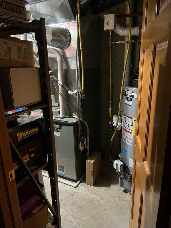 Performed comprehensive AC tune-up on Lennox system. Upon arrival, conducted initial consultation and system assessment. Inspected air filter and found it heavily soiled; replaced with new filter. Examined blower assembly, confirming proper balance and cleanliness. Verified evaporator coil condition and confirmed proper condensate drainage operation. 

Inspected outdoor condenser unit and identified significant debris accumulation restricting airflow through coil fins. Performed electrical testing on all system components, confirming voltage, amperage, and capacitor readings within manufacturer specifications. Conducted operational test with 15-minute runtime, measuring 23-24 degree temperature differential across system, indicating optimal cooling performance. All components functioning properly with no deficiencies noted.