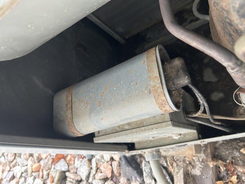 Responded to no-cooling complaint on approximately 40-year-old system experiencing ice buildup and freezing conditions. Upon inspection, found air filters and blower wheel relatively clean, but condenser unit required thorough cleaning before accurate diagnostics could be performed. After cleaning condenser coils and components, conducted refrigerant charge analysis which revealed abnormally low suction pressure and elevated superheat readings, confirming significant refrigerant undercharge. Provided system recharge options and scheduled follow-up consultation to discuss repair versus replacement recommendations given the age and condition of the equipment.