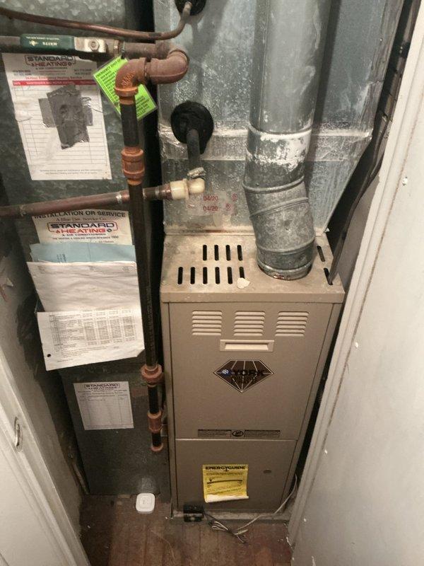 Responded to no cooling complaint on 17-year-old residential air conditioning system. Upon arrival, confirmed outdoor unit fan operational but no cooling capacity and elevated indoor humidity levels. Performed diagnostic evaluation and identified burned out contactor preventing compressor operation.

Replaced failed contactor and restored power to compressor. Conducted comprehensive system performance testing using digital manifold gauges to measure refrigerant pressures and electrical parameters. During testing, discovered compressor drawing abnormally high amperage, indicating potential compressor failure or system overcharge condition.

System returned to operational status following contactor replacement; however, elevated compressor amperage readings suggest underlying mechanical issues that may result in premature failure. Given the age of the equipment and compromised compressor performance, this repair should be considered temporary with limited longevity expected.

Documented 
