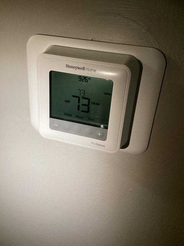 Responded to warranty call for recently installed AC system not maintaining desired temperature. Added refrigerant to achieve proper charge levels and verified 16-degree temperature split with 65-degree return air and 49-degree supply air. Identified potential ductwork issues affecting system performance, with evidence of inadequate return air volume or possible return air leakage pulling unconditioned air into the system, which may be contributing to reduced cooling capacity.
