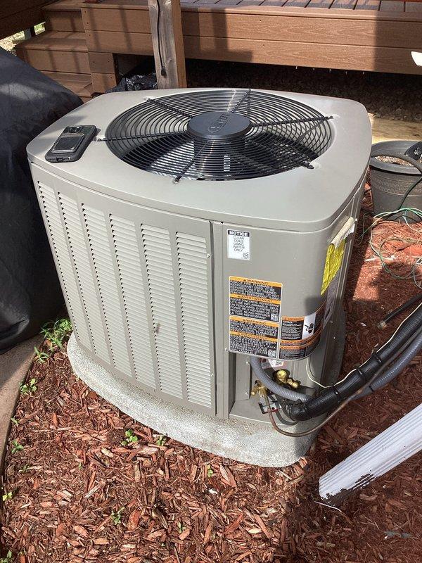 Responded to warranty call for recently installed AC system not maintaining desired temperature. Added refrigerant to achieve proper charge levels and verified 16-degree temperature split with 65-degree return air and 49-degree supply air. Identified potential ductwork issues affecting system performance, with evidence of inadequate return air volume or possible return air leakage pulling unconditioned air into the system, which may be contributing to reduced cooling capacity.