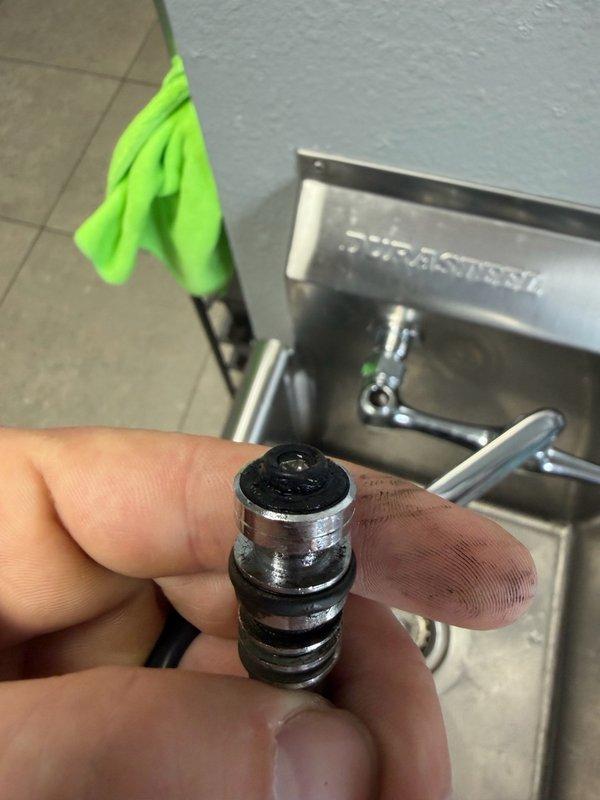 Responded to a service call for a continuously dripping prep sink that was previously installed. Upon diagnosis, identified a faulty hot side cartridge in the Durasteel faucet assembly as the source of the leak. Removed and inspected the defective cartridge, documented the failed component with photographs, and provided an estimate for cartridge replacement to resolve the dripping issue.