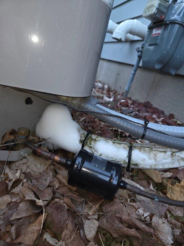 Responded to a second-opinion service call on a 2017 Carrier single-stage air conditioning system with reported suction line freezing and history of repeated refrigerant leak repairs by another contractor. Upon arrival, found the air filter completely plugged, restricting airflow, and the outdoor condenser coil requiring cleaning. Performed system diagnostics and measured superheat, subcooling, and temperature split across the evaporator coil. Results showed 17°F temperature split with acceptable refrigerant charge levels at time of inspection, indicating the freezing issue was likely caused by restricted airflow rather than low refrigerant. Replaced deteriorated suction line insulation on the refrigerant line set to restore proper vapor line protection and prevent future sweating and ice formation. Recommended scheduling a furnace inspection for the 2010 Carrier Infinity system due to known heat exchanger concerns in that model year, and suggested ductwork cleaning following recent ba