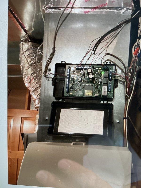 Responded to warranty call for outdoor AC unit installed six weeks prior experiencing loud vibration and rattling noise during fan operation. Diagnosed issue as loose plastic fan insert causing vibration against fan mount assembly. Removed fan mount screws, repositioned and secured plastic fan insert, then reinstalled and tightened fan mount to manufacturer specifications. Tested unit operation to verify elimination of noise and vibration, confirming proper fan operation and system performance.