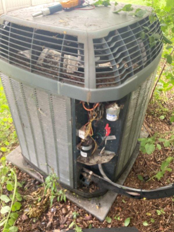 Responded to no cooling complaint on 12+ year old system where condenser fan would not run but unit attempted to start with humming noise. Diagnosed failed capacitor on outdoor condenser unit, which had visibly failed. Replaced capacitor and restored normal operation. Verified system performance with temperature drop measurement of 14°, which was acceptable given extremely high ambient humidity levels and elevated dewpoint conditions at time of testing. Performed condenser coil cleaning as part of maintenance membership benefits. System operating normally upon completion, with recommendation to monitor performance and recheck if cooling issues persist once humidity levels normalize.
