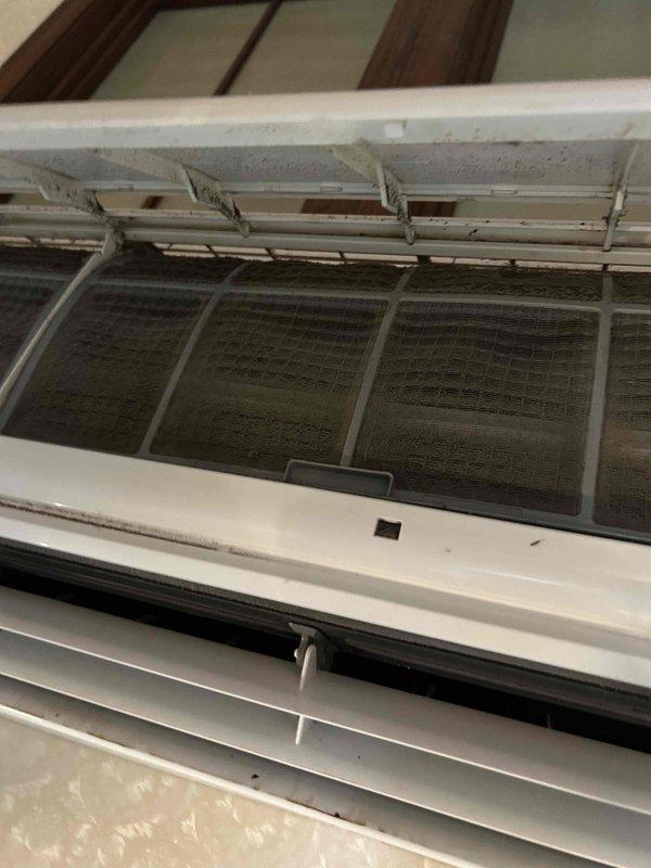 Responded to no cooling complaint on older wall-mounted mini split system at bed-and-breakfast property. Upon inspection, found indoor air filters and outdoor condenser coil heavily clogged with dust and debris. Cleaned filters and condenser coil, then tested system on maximum cooling which resulted in evaporator coil freezing. Connected manifold gauges and confirmed system was low on refrigerant charge. Discussed findings with property owner, presenting repair versus replacement options. Due to active guests on property, owner requested immediate repair to restore cooling capacity. Added refrigerant to manufacturer specifications and tested system operation. Unit achieved proper cooling temperatures and maintained stable operation. Coordinated with service advisor to schedule estimate for new mini split replacement system.