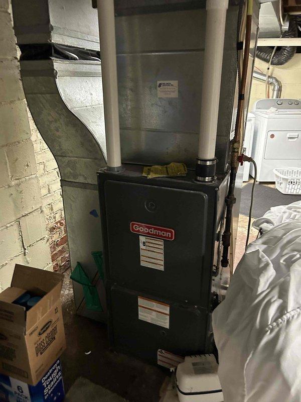 Responded to no cooling complaint on older wall-mounted mini split system at bed-and-breakfast property. Upon inspection, found indoor air filters and outdoor condenser coil heavily clogged with dust and debris. Cleaned filters and condenser coil, then tested system on maximum cooling which resulted in evaporator coil freezing. Connected manifold gauges and confirmed system was low on refrigerant charge. Discussed findings with property owner, presenting repair versus replacement options. Due to active guests on property, owner requested immediate repair to restore cooling capacity. Added refrigerant to manufacturer specifications and tested system operation. Unit achieved proper cooling temperatures and maintained stable operation. Coordinated with service advisor to schedule estimate for new mini split replacement system.