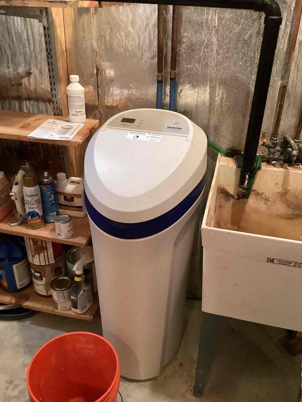 Responded to service call for a 5-year-old water softener unit experiencing improper cycling and excessive water accumulation in the tank. Diagnosed control settings malfunction, performed complete system reset, and adjusted programming parameters to restore proper regeneration cycle operation.