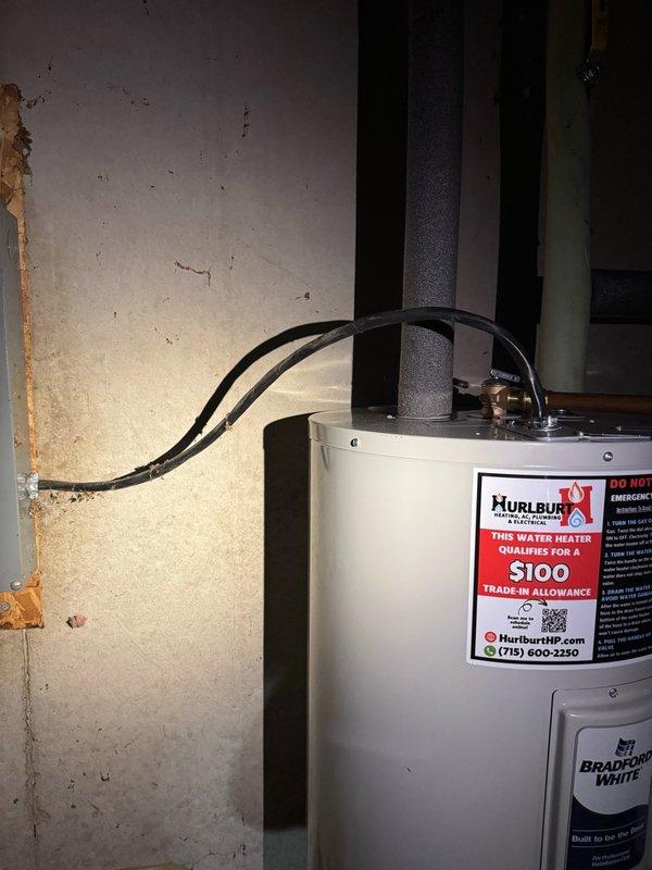 Responded to service call for leaking water heater in basement utility area. Upon inspection, found active leak originating from top heating element and tank body of existing 50-gallon electric water heater. Drained and removed failed unit from installation location. Installed new Bradford White 50-gallon electric water heater as direct replacement, including new expansion tank to protect home's water lines, fixtures, and extend tank longevity. Connected all electrical and plumbing connections to code specifications. Unit tested and verified operational with no leaks detected. Installation includes 10-year parts and tank warranty with 1-year labor warranty.