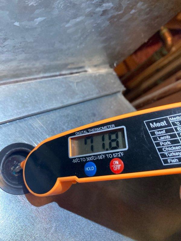Responded to no cooling complaint on 3-month-old Lennox system utilizing R454B refrigerant with short cycling issue and error code 422. Upon arrival, found outdoor unit heavily obstructed with cottonwood debris blocking airflow to condenser coil. Indoor temperature holding at 79°F with compressor cycling off while fan continued to run.

Performed thorough inspection and diagnostic testing. Cleaned condenser coil by rinsing down unit to remove cottonwood blockage and checked air filter. Initial refrigerant readings showed abnormal pressures: low side 87 PSI with 54°F superheat and 29°F vapor saturation temperature; high side 336 PSI with 16°F subcooling and 107°F liquid saturation temperature. Delta-T measured only 14°F, indicating insufficient cooling capacity.

Due to improper refrigerant charge and system performance issues, recovered 6 pounds 10 ounces of R454B refrigerant from system. Evacuated and recharged system with fresh refrigerant at proper weight of 6 pounds 10 ounces per m