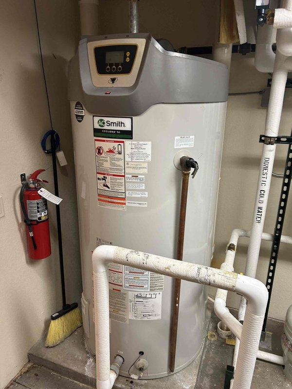 Responded to multiple A.O. Smith Vertex 199 MBtu tankless water heaters experiencing simultaneous performance issues. Verified gas fuel pressure at inlet and discovered pressure dropping significantly below the required minimum of 1 inch water column during operation. Attempted to boost gas pressure to restore proper function, but units continued to fail under load conditions. Diagnosed inadequate gas supply as root cause affecting multiple water heaters concurrently. Documented existing conditions including water heater installations, gas piping system, pressure regulation equipment, and utility connections. Provided quote for necessary gas supply system repairs to restore proper operating pressure and water heater functionality.