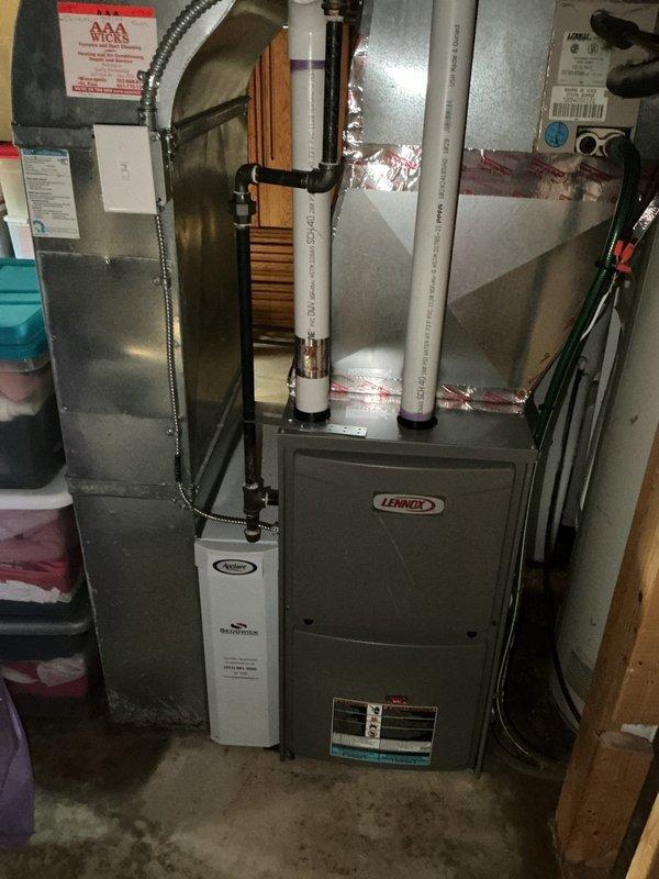 Responded to no cooling complaint on 32-year-old residential air conditioning system. Upon inspection, found failed capacitor and replaced unit. System remained inoperative due to high pressure safety switch lockout that could not be reset through normal procedures. Bypassed high pressure switch as temporary measure to restore cooling operation. Advised customer this is a temporary repair without guarantee due to underlying system issues and age of equipment. Observed significant debris accumulation in outdoor unit cabinet and general wear consistent with three decades of operation. System currently operational but requires replacement due to age and compromised safety controls.