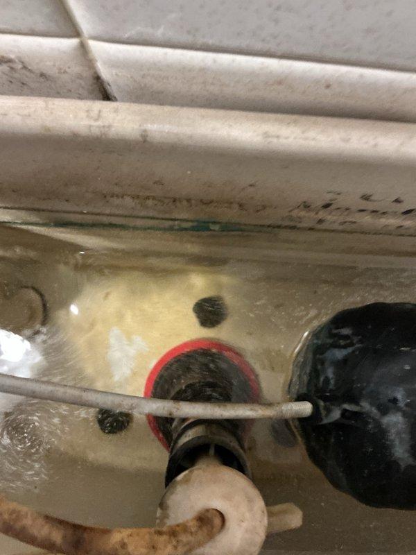 Responded to service call for toilet not flushing properly with handle feeling unstable. Upon inspection, identified unit as Mansfield model toilet with worn flush valve gasket causing flush failure. Removed old deteriorated gasket showing significant wear and mineral buildup. Installed new Mansfield-compatible flush valve gasket and tested flush mechanism for proper operation. Toilet now flushing correctly with restored handle functionality. Provided replacement toilet options but repair was completed per customer preference.