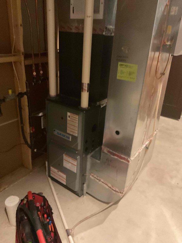 Responded to water leak at 50-gallon electric water heater originally installed in November. Upon inspection, identified copper pipe leak at top of unit caused by failed temperature and pressure relief valve. Replaced defective T&P valve and verified proper operation with no further leakage detected.