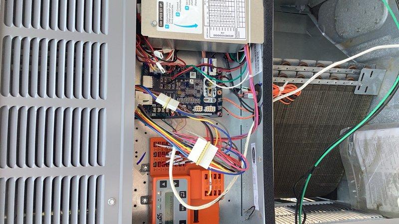 Responded to service call for two Carrier rooftop units installed within the past year under parts and labor warranty. Attempted installation of CO2 sensors for economizer control on both units. Encountered communication failure between CO2 sensors and economizer control panels. Contacted manufacturer technical support but unable to resolve sensor connectivity issues. Bypassed economizer functions on both units to restore cooling operation. Units currently operating in cooling mode with economizer controls disabled. Further technical assistance required to establish proper sensor communication or determine if alternative sensors are needed for full economizer functionality.