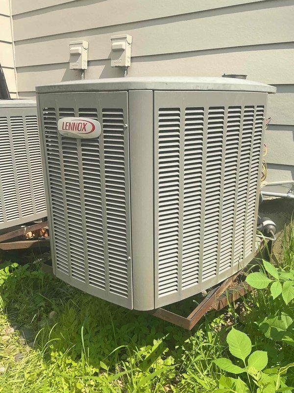 Performed annual cooling maintenance inspection on two 19-year-old Lennox air conditioning units. During inspection, discovered extensive rodent damage to low and high voltage wiring on the first unit, limiting ability to complete full diagnostic testing beyond refrigerant charge verification. Identified worn capacitors and contactors on both units requiring replacement. Second unit showed no wiring damage and is functioning properly. Documented findings with photos, provided repair options via email, and scheduled follow-up service advisor consultation for recommended repairs.