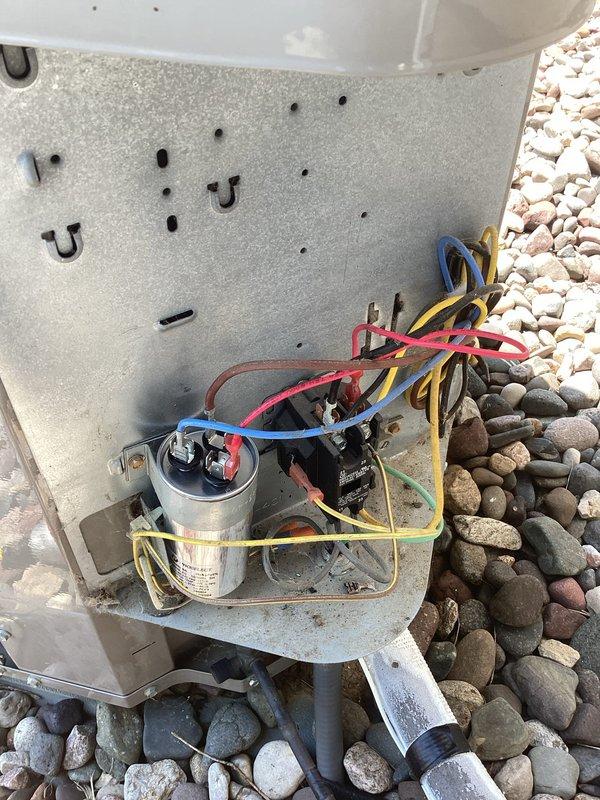 Responded to no cooling complaint on residential air conditioning system. Found failed capacitor that had been previously installed by our company. Capacitor had catastrophically failed and required replacement. Replaced defective capacitor under warranty at no charge to customer. System tested and verified proper operation with adequate cooling restored.