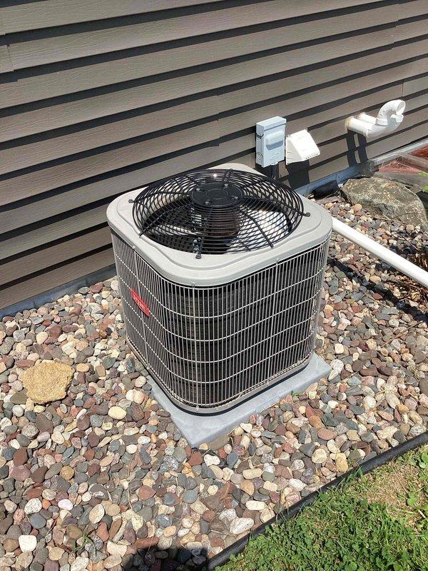 Responded to no cooling complaint on residential air conditioning system. Found failed capacitor that had been previously installed by our company. Capacitor had catastrophically failed and required replacement. Replaced defective capacitor under warranty at no charge to customer. System tested and verified proper operation with adequate cooling restored.