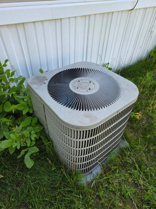 Responded to no cooling complaint on aging R-22 air conditioning system. Upon arrival, observed condenser fan attempting to start then stopping, with unit humming and blowing warm air only. Diagnosed failed capacitor preventing proper compressor and fan motor operation. Provided estimate for capacitor replacement and discussed system age, R-22 refrigerant phase-out implications, and replacement considerations with homeowner. Customer elected to schedule comfort advisor consultation for system replacement options given recent furnace upgrade and desire to update cooling equipment. Documented findings with photos and forwarded capacitor repair estimate. Unit remains non-operational pending customer decision.