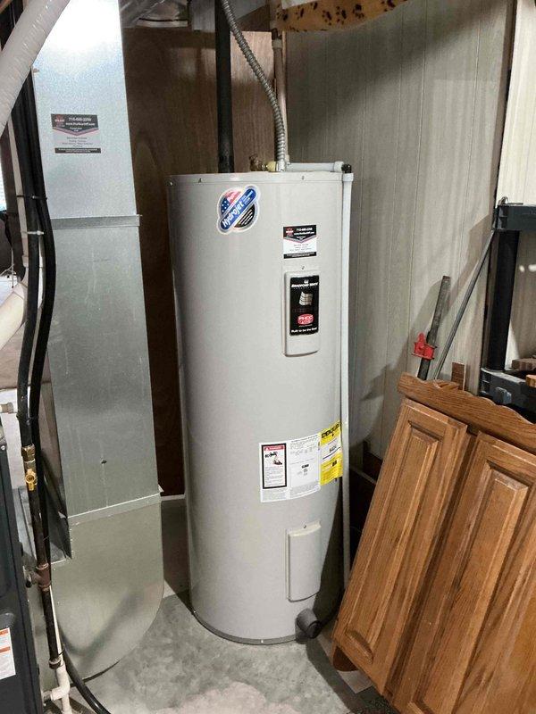Responded to no cooling complaint on 9-year-old residential AC system. Found outdoor unit not operating despite contactor clicking. Diagnostics revealed tripped breaker at electrical panel, which occurred after thermostat battery replacement. Reset breaker, restored power to outdoor unit, and verified compressor and condenser fan motor operation. Tested all system components and confirmed proper operation with 20-degree temperature split across evaporator coil.