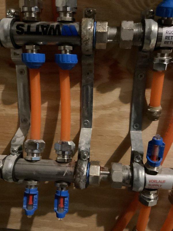 Conducted follow-up phone call to review previous service visit and discuss system configurations. Customer expressed interest in obtaining estimates for two potential projects: zoning the basement heating system separately from the garage area, and installing a combination boiler system. Documented existing radiant heating manifold with PEX distribution lines and electrical panel for future estimate preparation.