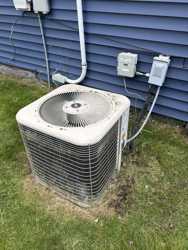 Responded to no cooling complaint on 1999 Lennox air conditioning system with reported buzzing noise from outdoor unit. Upon inspection, diagnosed failed run capacitor causing compressor malfunction. Replaced defective capacitor with new component, restored power, and verified proper system operation with 15-degree delta T across evaporator coil, confirming adequate cooling performance.