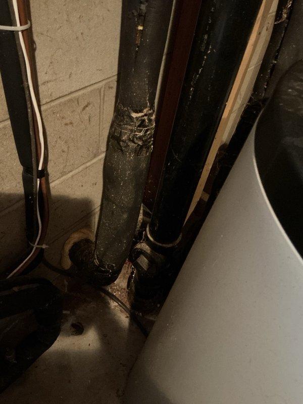Responded to callback regarding pressure tank installed in March. Customer reported high electric bills and continuous running when secondary valve was open, with wet spot appearing in area. Upon inspection, identified secondary valve as feed line for geothermal system. Explained valve function and confirmed customer's observation that system operates correctly at 70 PSI with secondary valve closed. Advised customer to keep secondary valve in closed position as previously configured. Verified wet spot resolved with valve closure and confirmed proper tank pressurization. Documented installation with photos showing pressure tank assembly, copper piping connections, valve configuration, and geothermal feed line. No further adjustments required.