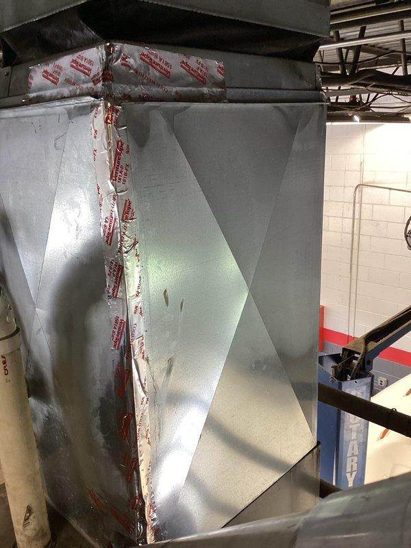 Replaced evaporator coil on commercial AC unit and installed rubber brace under blower motor assembly to reduce vibration noise. Recharged refrigerant lost during pump down, installed new 16x25x1 furnace filter, and cleaned condenser coil. System tested and verified operating at optimal parameters with 10 degrees subcooling and 20 degree temperature split across evaporator coil.