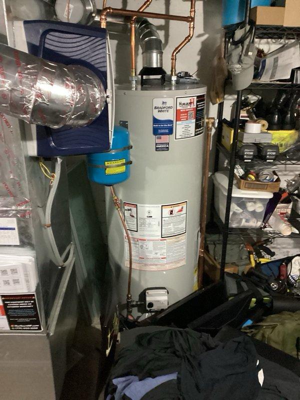 Replaced evaporator coil on commercial AC unit and installed rubber brace under blower motor assembly to reduce vibration noise. Recharged refrigerant lost during pump down, installed new 16x25x1 furnace filter, and cleaned condenser coil. System tested and verified operating at optimal parameters with 10 degrees subcooling and 20 degree temperature split across evaporator coil.