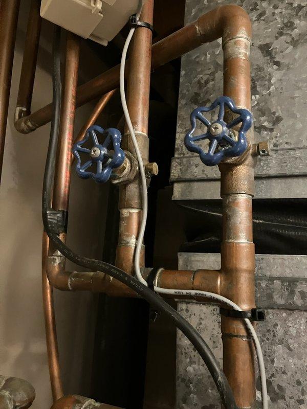 Responded to service call for leaking indoor hose bibs causing water intrusion inside the residence. Upon arrival, inspected the existing copper plumbing configuration and identified two faulty hose bibs requiring replacement. Provided estimate for complete replacement of both indoor spigots to eliminate active leaks and prevent further water damage to the property.