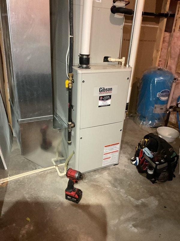 Responded to no cooling complaint on 13-year-old Nordyne air conditioning system experiencing repeated freeze-up conditions. Upon arrival, unit had been shut off by homeowner to allow ice to thaw. Disassembled evaporator coil for thorough inspection to rule out airflow restrictions and verified coil was clean and unobstructed. Inspected blower assembly and confirmed proper operation. Diagnostic testing revealed system was operating with insufficient refrigerant charge. Added one pound of R-410A refrigerant to system and verified proper operation. Post-service measurements confirmed 8°F subcooling. Homeowner will schedule follow-up appointment for comfort advisor consultation at later date due to scheduling constraints.