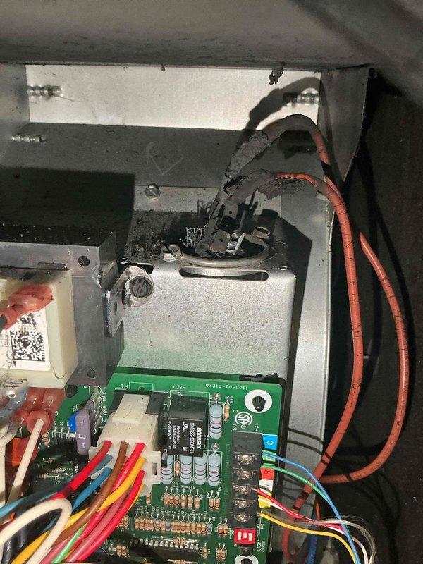 Responded to no cooling complaint on 30+ year old air conditioning system. Upon inspection, discovered multiple critical component failures including blower motor, capacitor, and control board. Motor and capacitor showed visible burn damage and complete failure. Further investigation revealed severe rust and corrosion on heat exchanger caused by water leakage from indoor evaporator coil dripping onto furnace components. Due to age of equipment and extent of damage affecting both heating and cooling systems, determined repair was not economically viable. Disconnected power to furnace for safety. Documented failed components with photos of damaged control board, burned capacitor, and electrical panel. Recommended complete system replacement of both furnace and air conditioning unit. Scheduled follow-up appointment for replacement estimate.