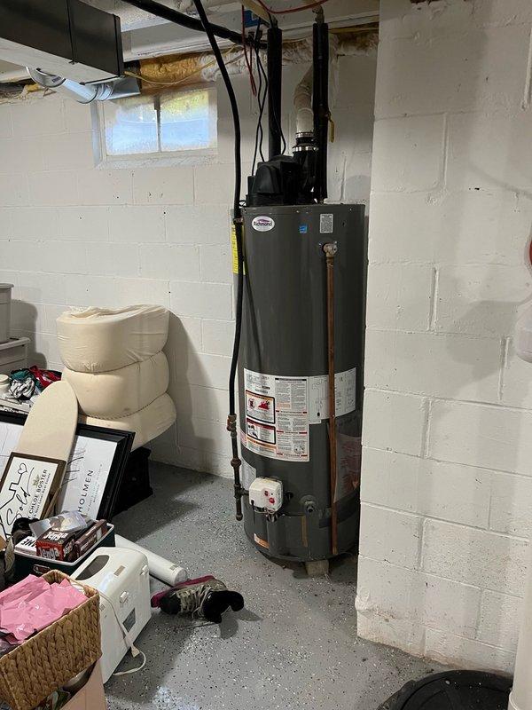 Responded to no cooling complaint on 10+ year old system at lower rental unit. Upon arrival, found system running with excessive moisture around furnace indicating previous freeze-up condition. Verified adequate airflow and clean filters throughout system. Inspected outdoor condensing unit and discovered refrigerant charge severely low on R-410A. Contacted property owner with findings and explained system has active refrigerant leak requiring repair. Provided leak repair estimates and discussed system age considerations for future reliability. Property owner agreed to schedule equipment replacement consultation for following day.