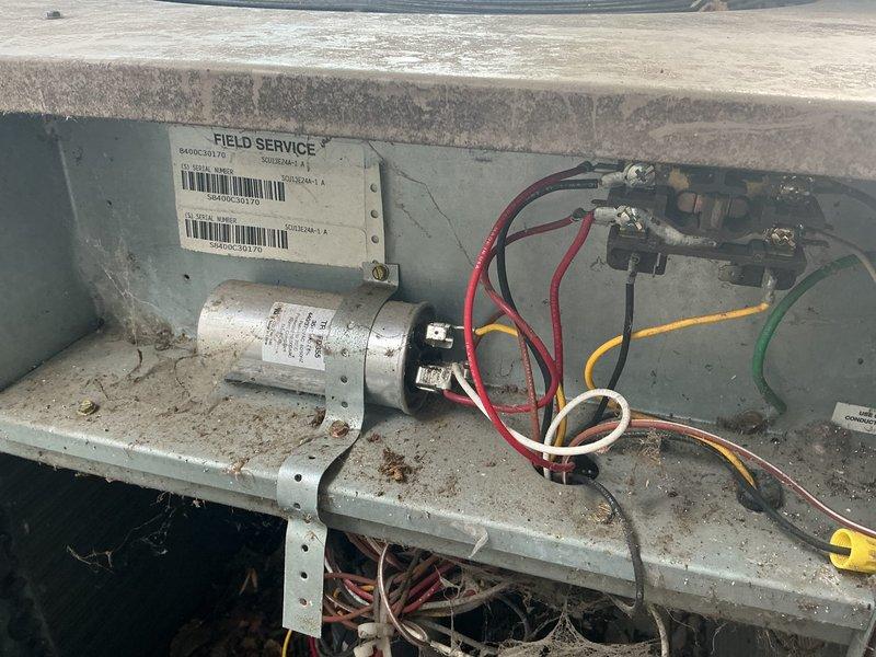 Responded to no-cool call on 26-year-old R22 system. Found compressor cycling intermittently with high amp draw, indicating compressor failure. System utilizing obsolete R22 refrigerant. Recommended full system replacement due to age, refrigerant obsolescence, and failed compressor. Scheduled same-day replacement estimate.