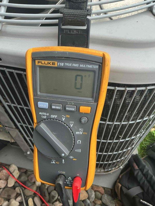 Responded to no cooling complaint on 10-year-old Carrier air conditioning system. Upon arrival, confirmed unit was completely non-operational with no power to compressor or condenser fan. Diagnostic testing revealed failed dual run capacitor preventing system startup. Measured capacitance values and confirmed capacitor was out of specification and required replacement.

Installed new dual run capacitor and restored power to unit. Verified contactor operation and confirmed proper engagement. Measured compressor and condenser fan motor amp draws, which were within manufacturer specifications. Checked refrigerant charge using temperature and pressure readings; values appeared slightly skewed due to excessive dehumidification load but determined charge was adequate. Inspected air filter and found it clean with no restrictions. Visually inspected evaporator coil and confirmed it was clean with no blockage affecting airflow.

System successfully returned to normal cooling operation. Discusse