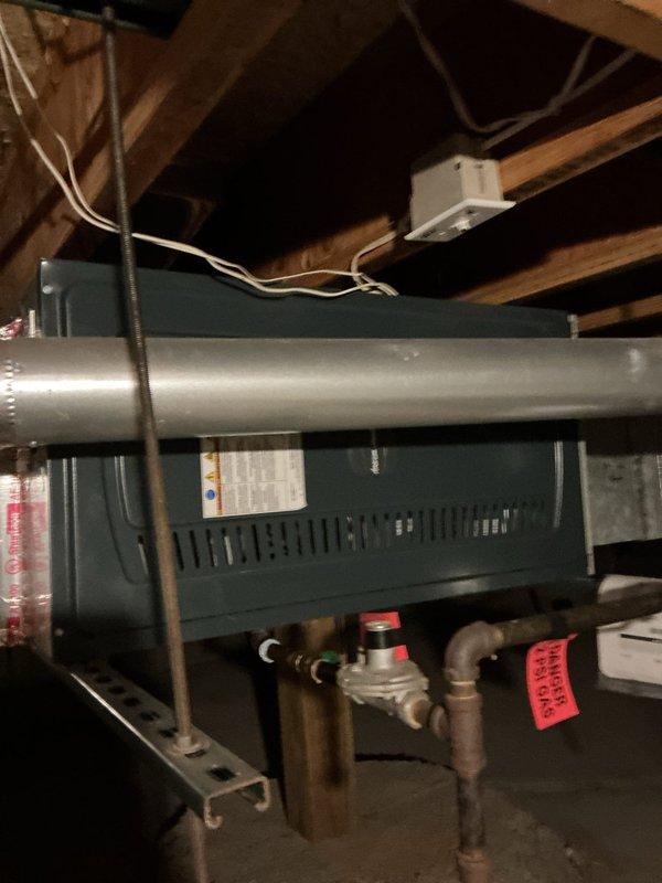 Completed comprehensive air conditioning tune-up on residential split system, including inspection of indoor air handler unit in attic and outdoor condenser unit. Installed locking refrigerant line caps on outdoor unit to prevent tampering and unauthorized refrigerant access, which were previously missing from the system.